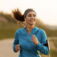 A Woman Jogging Focused On Fitness — Bespoke in Southport, QLD